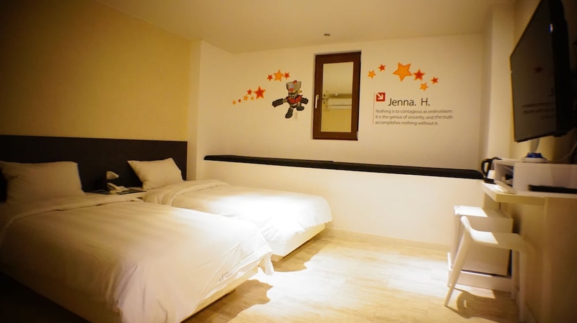 Imagen de la habitación del Hotel At Noon. Foto 5