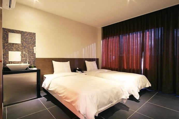 Imagen de la habitación del Hotel At Noon. Foto 12
