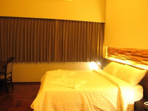 Imagen de la habitación del Hotel At One Inn. Foto 22