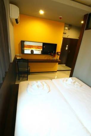 Imagen de la habitación del Hotel At One Inn. Foto 28