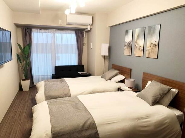 Imagen de la habitación del Hotel At Rlis House Tsutenkaku. Foto 12