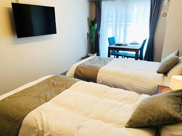 Imagen de la habitación del Hotel At Rlis House Tsutenkaku. Foto 13