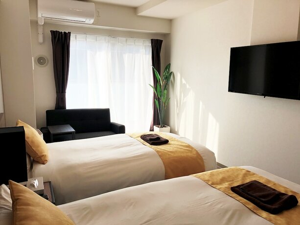Imagen de la habitación del Hotel At Rlis House Tsutenkaku. Foto 23