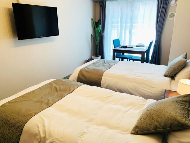 Imagen de la habitación del Hotel At Rlis House Tsutenkaku. Foto 24