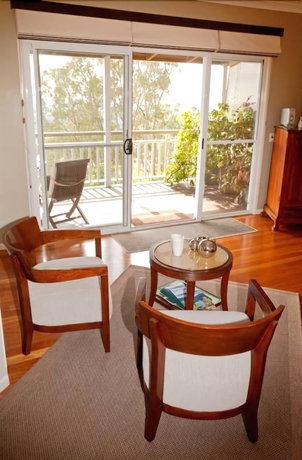 Imagen de la habitación del Hotel At Sunrise Cottages. Foto 6