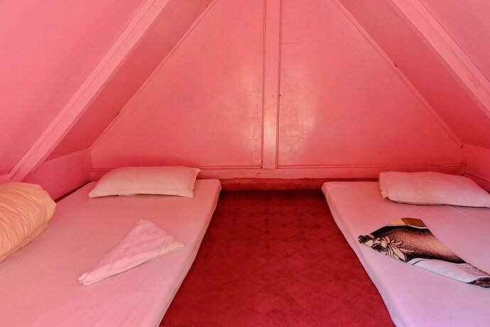 Imagen de la habitación del Hotel At The End Of The Universe. Foto 12