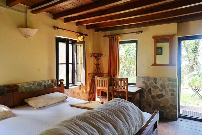 Imagen de la habitación del Hotel At The End Of The Universe. Foto 13