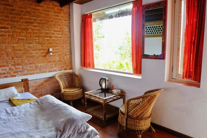 Imagen de la habitación del Hotel At The End Of The Universe. Foto 15