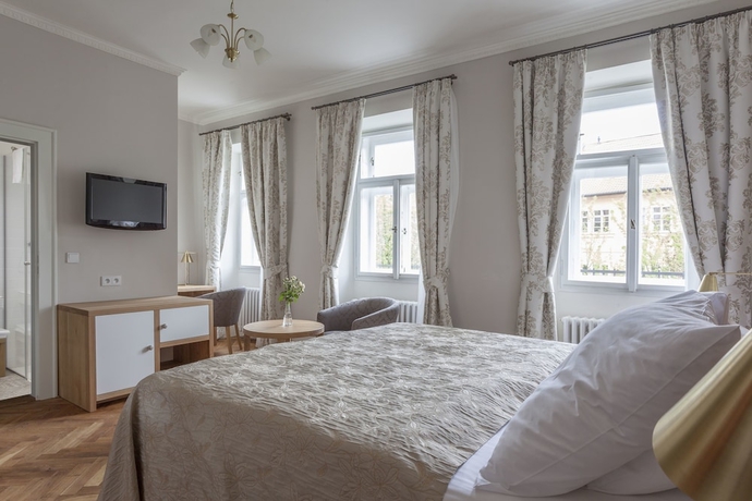 Imagen de la habitación del Hotel At The Golden Scissors. Foto 12
