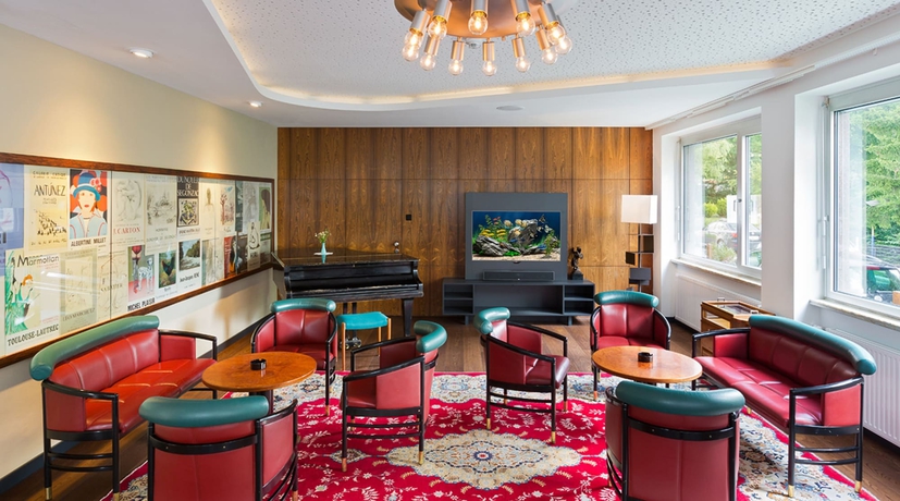 Imagen del bar/restaurante del Hotel At The Park, Baden. Foto 2