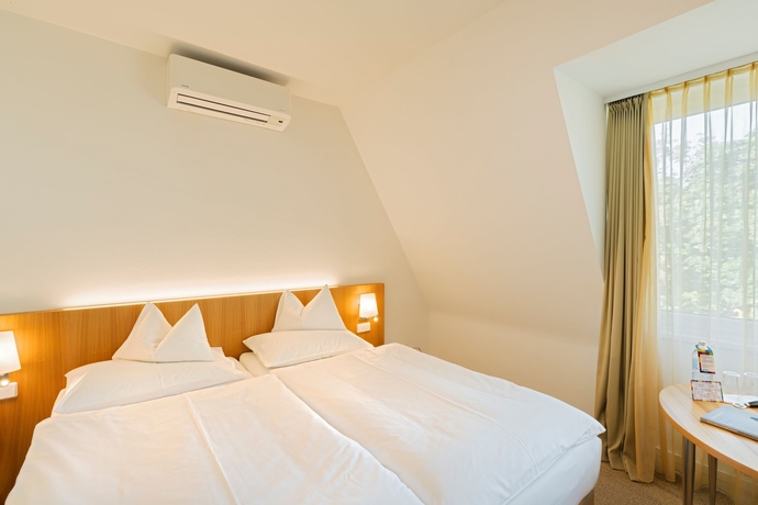 Imagen de la habitación del Hotel At The Park, Baden. Foto 17