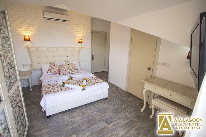 Imagen de la habitación del Hotel Ata Lagoon Beach. Foto 9