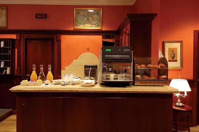 Imagen del bar/restaurante del Hotel Atahotel De Angeli. Foto 2