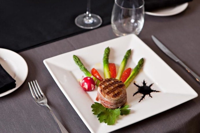 Imagen del bar/restaurante del Hotel Atahotel Quark Hotel. Foto 5