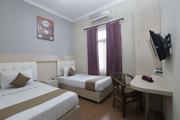 Imagen de la habitación del Hotel Atalie Malioboro. Foto 11