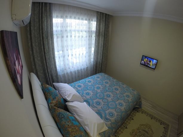 Imagen de la habitación del Hotel Atam Suites and Apart. Foto 5