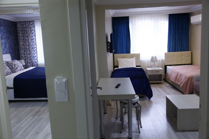 Imagen de la habitación del Hotel Atam Suites and Apart. Foto 11