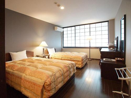 Imagen de la habitación del Hotel Atami Onsen Yume Iroha. Foto 15