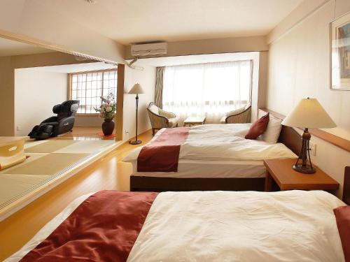 Imagen de la habitación del Hotel Atami Onsen Yume Iroha. Foto 17