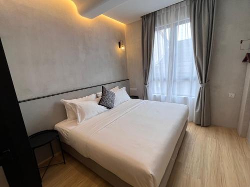 Imagen de la habitación del Hotel Atelier Abiad Johor Bahru. Foto 19