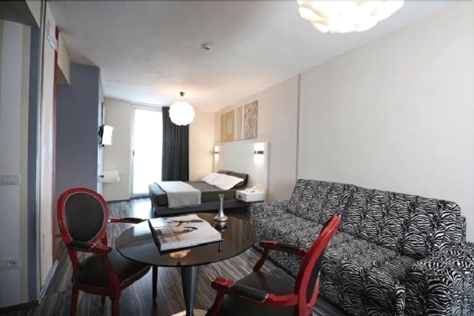 Imagen de la habitación del Hotel Atelier Design. Foto 7