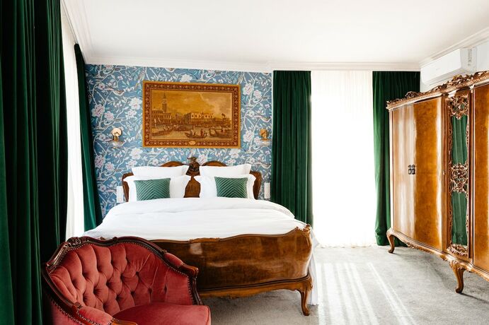 Imagen de la habitación del Hotel Ateneea Luxury Rooms. Foto 14