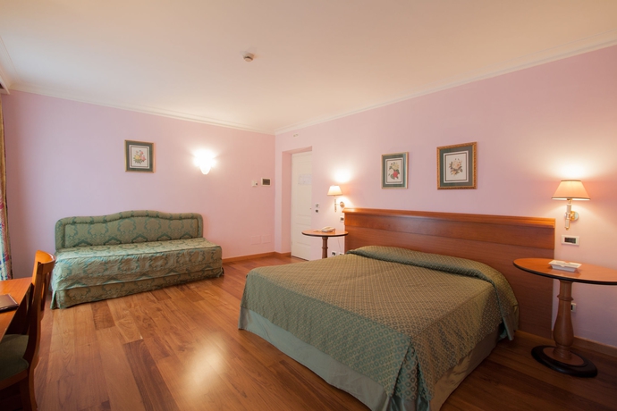 Imagen de la habitación del Hotel Ateneo Garden Palace. Foto 7