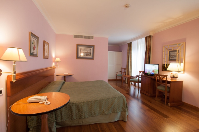 Imagen de la habitación del Hotel Ateneo Garden Palace. Foto 9