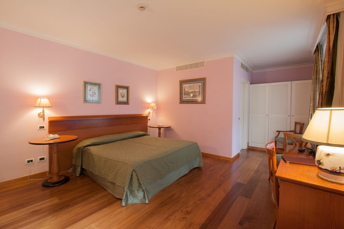 Imagen de la habitación del Hotel Ateneo Garden Palace. Foto 10