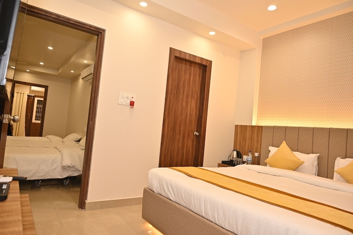 Imagen de la habitación del Hotel Atharv Kaashi - Behind Sigra Sports Stadium. Foto 5