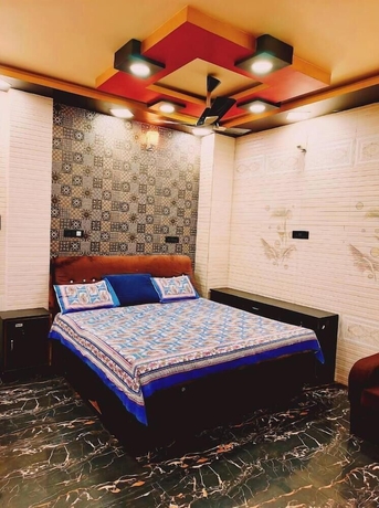 Imagen de la habitación del Hotel Atharv Paying Guest House. Foto 2