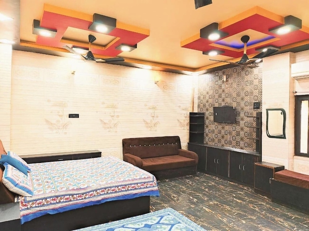 Imagen de la habitación del Hotel Atharv Paying Guest House. Foto 3