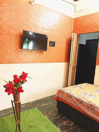 Imagen de la habitación del Hotel Atharv Paying Guest House. Foto 4