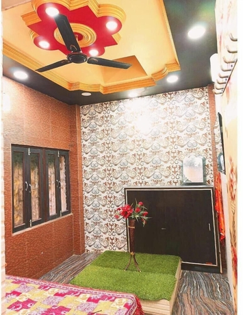 Imagen de la habitación del Hotel Atharv Paying Guest House. Foto 5