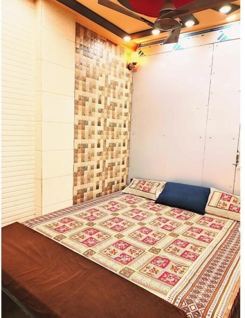 Imagen de la habitación del Hotel Atharv Paying Guest House. Foto 6
