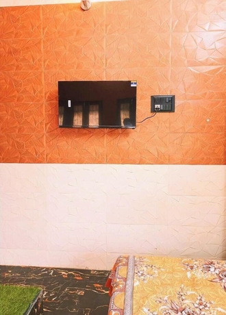 Imagen de la habitación del Hotel Atharv Paying Guest House. Foto 10