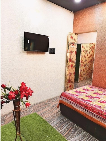 Imagen de la habitación del Hotel Atharv Paying Guest House. Foto 12