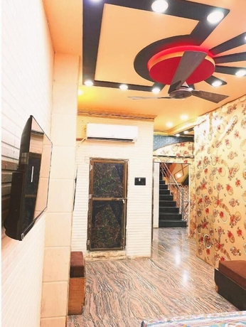 Imagen de la habitación del Hotel Atharv Paying Guest House. Foto 13