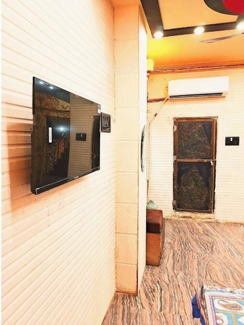 Imagen de la habitación del Hotel Atharv Paying Guest House. Foto 14