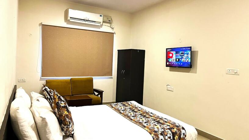 Imagen de la habitación del Hotel Athasri HSR Layout. Foto 15