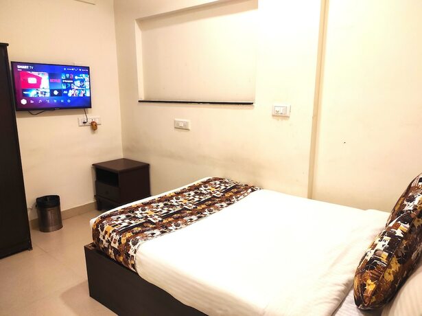 Imagen de la habitación del Hotel Athasri HSR Layout. Foto 17