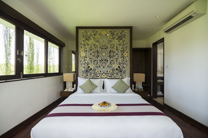 Imagen de la habitación del Hotel Athaya Ubud. Foto 13