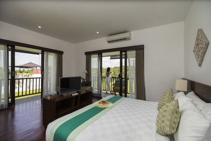 Imagen de la habitación del Hotel Athaya Ubud. Foto 15