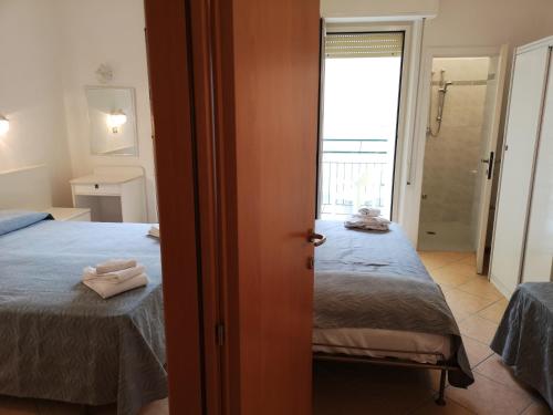 Imagen de la habitación del Hotel Athena B&B. Foto 8