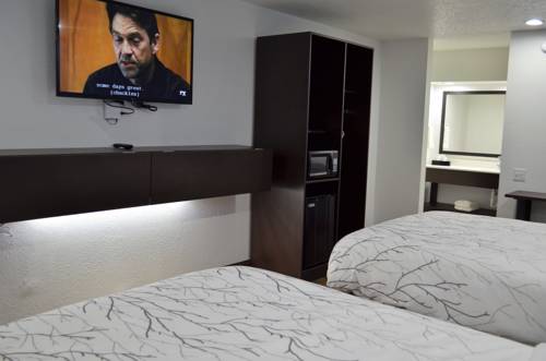 Imagen de la habitación del Hotel Athena Inn. Foto 3