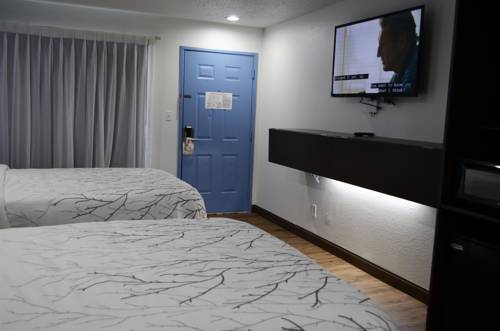 Imagen de la habitación del Hotel Athena Inn. Foto 4