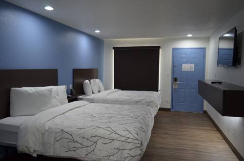 Imagen de la habitación del Hotel Athena Inn. Foto 10