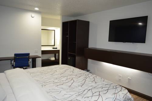 Imagen de la habitación del Hotel Athena Inn. Foto 11