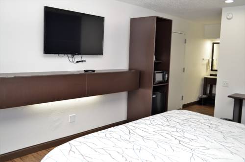 Imagen de la habitación del Hotel Athena Inn. Foto 13