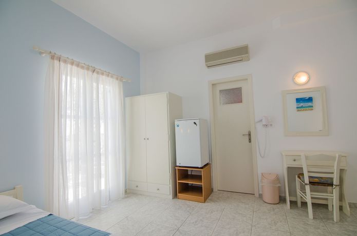 Imagen de la habitación del Hotel Athena Rooms. Foto 10